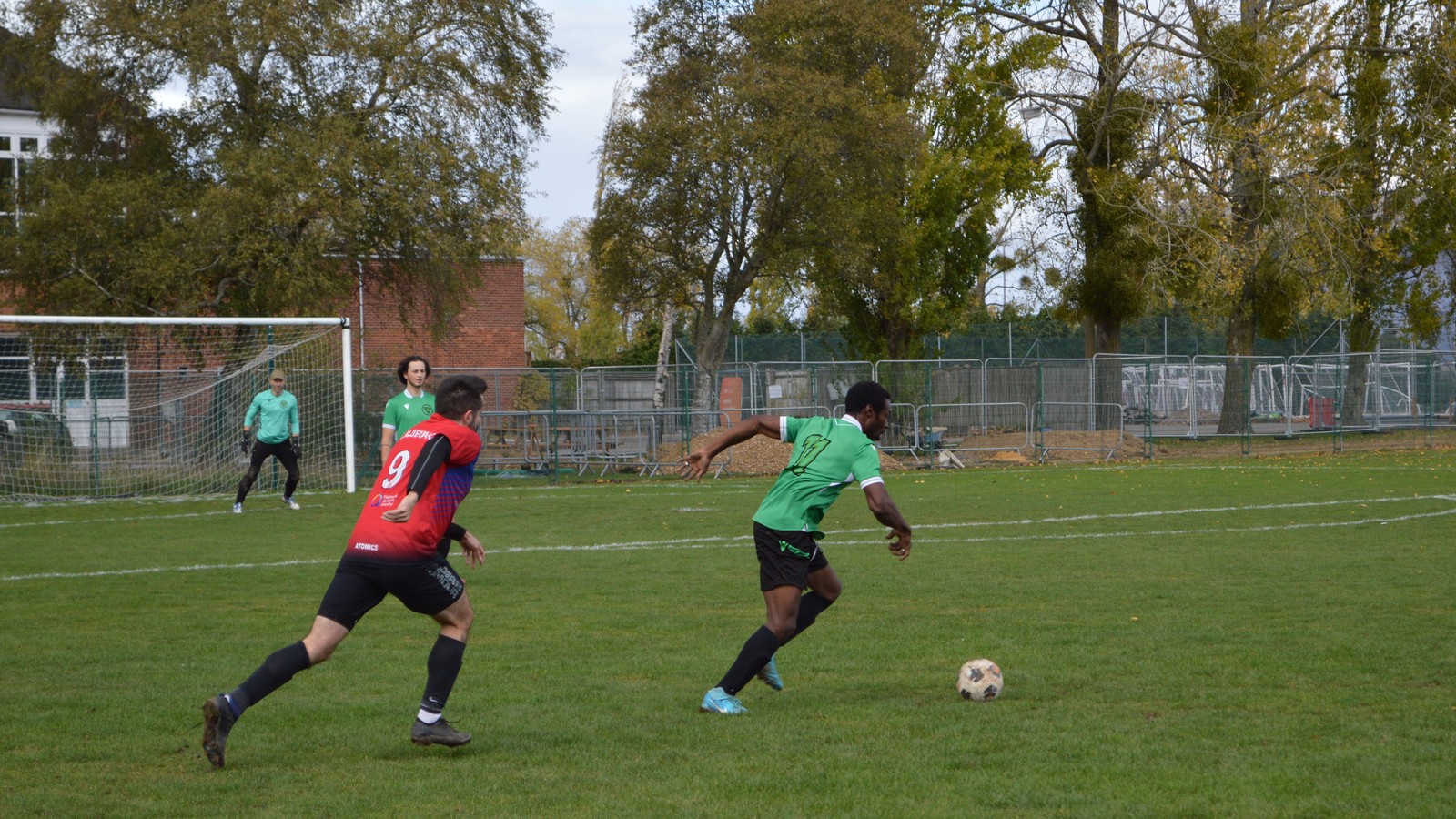 A Bracknell Panthers FC player competing for the ball in an away league fixture